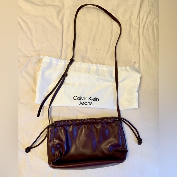 Calvin Klein Burgundy Cross Body Drawstring Bag - Picture 5 of 5